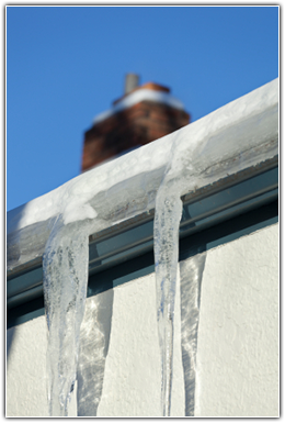 Ice Dam Being Removed from a Minnesota Roof